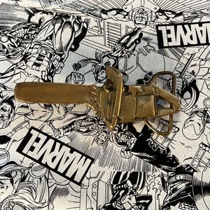 Vintage chain saw belt buckle